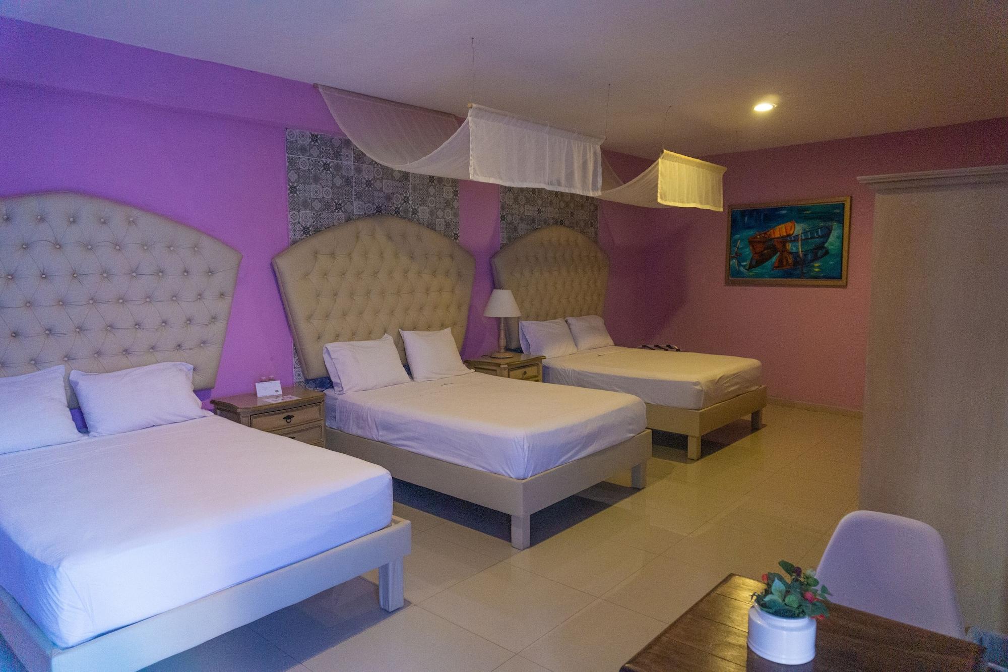 Hotel Lavanda CAS Mérida Buitenkant foto A room at the hotel
