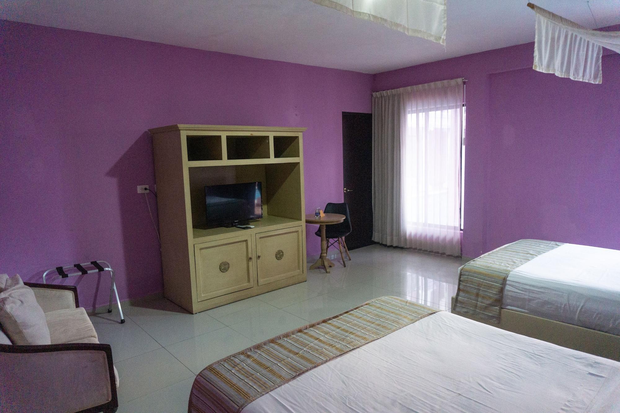 Hotel Lavanda CAS Mérida Buitenkant foto A room at the hotel