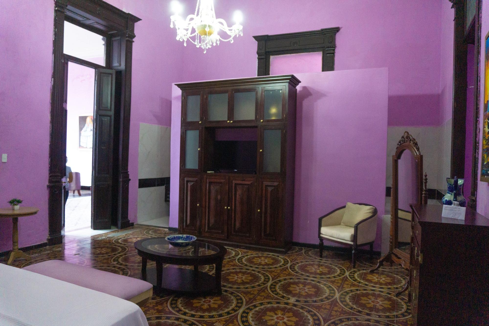 Hotel Lavanda CAS Mérida Buitenkant foto A room at the hotel