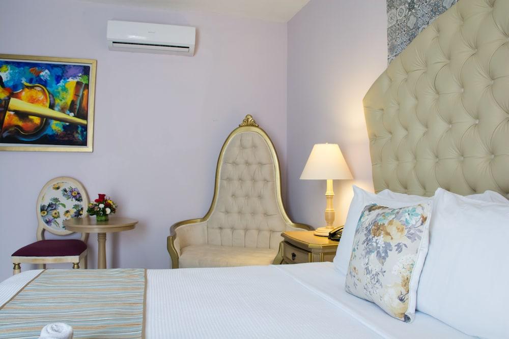 Hotel Lavanda CAS Mérida Buitenkant foto A room at the hotel