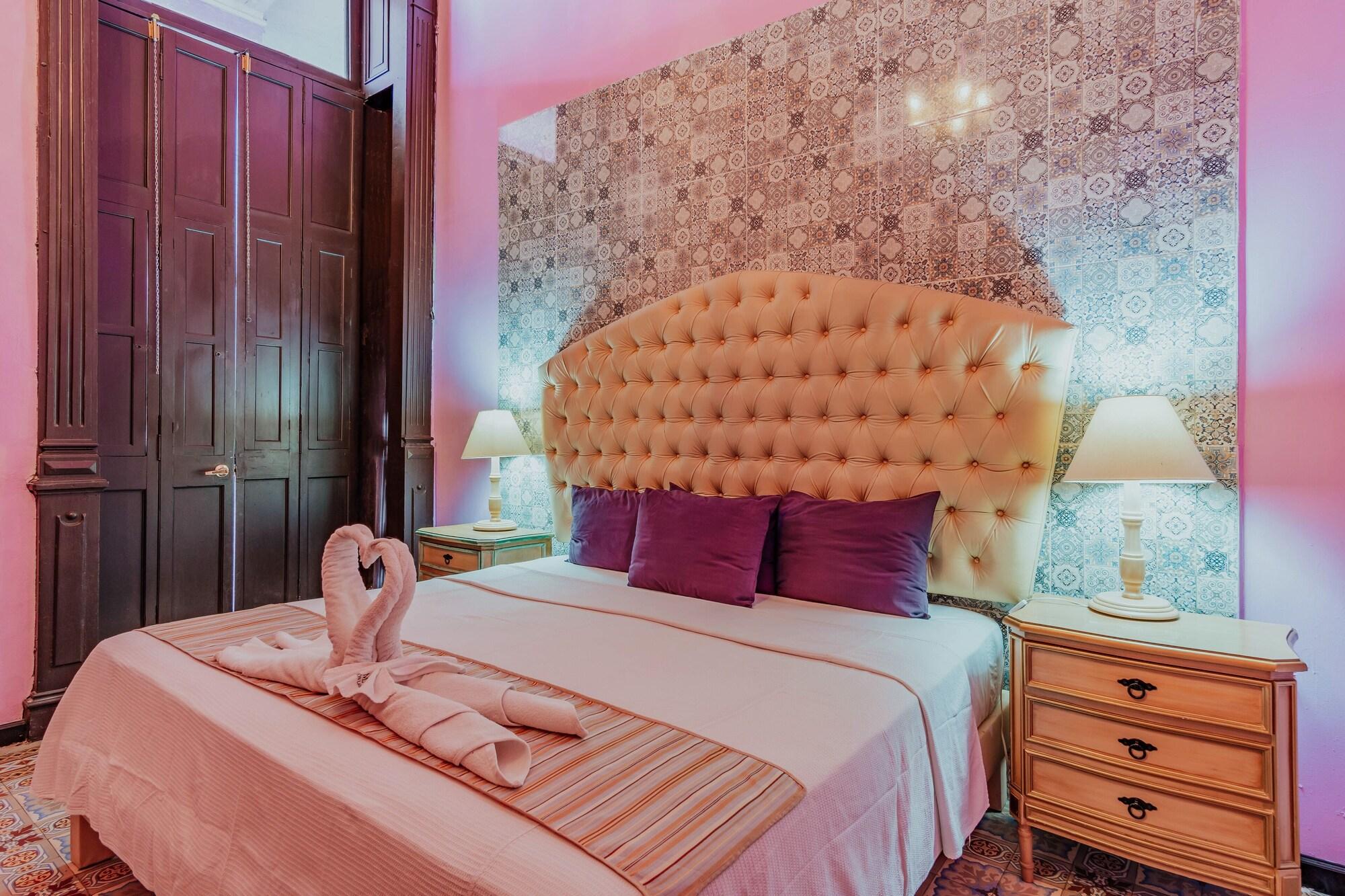 Hotel Lavanda CAS Mérida Buitenkant foto A bedroom at the hotel