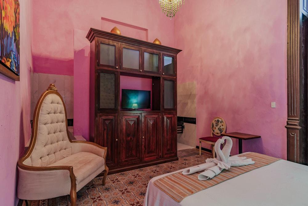 Hotel Lavanda CAS Mérida Buitenkant foto A room at the hotel
